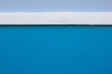 Blue blank concrete wall white color for texture background.