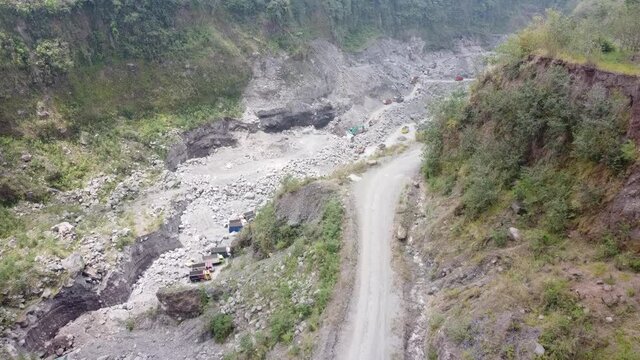 aerial footage of volcanic ravines on the slopes of Mount Merapi