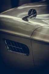 Foto op Canvas Small side view mirror of a classic car © bizoo_n