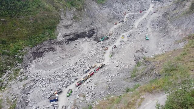 aerial footage of volcanic sand mining