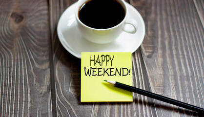 Business HAPPY WEEKEND . Yellow stickers with text on wooden background with coffee