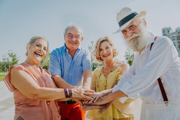 Group of senior people bonding outdoors