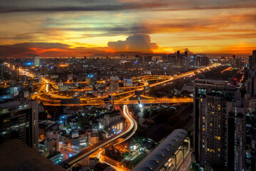 Fototapeta na wymiar Light from road and high way in Bangkok city in morning sunrise time