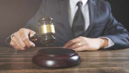 lawyer working with lawsuit in courtroom.