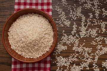 organic rice in bowl and with red napkin