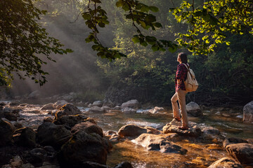 Obraz premium A woman explores new, magical, and fantastic places around the world