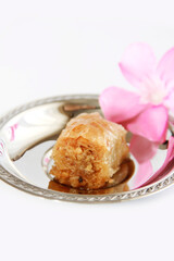 traditional Oriental sweetness of baklava on a decorative plate