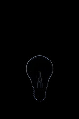 light bulb on black background