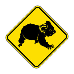 Koala road sign. Vector illustration of yellow diamond shaped traffic sign with koala icon inside. Koalas crossing warning symbol isolated on white background. Australian animal sign. © Fast_Cyclone