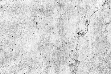 Texture of a concrete wall with cracks and scratches which can be used as a background