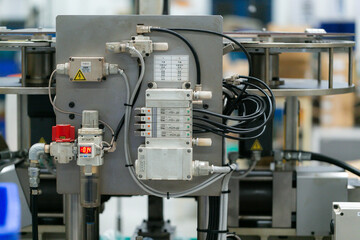 Machine part with pneumatic equipment and hydraulic system, electric part and a mechanical device for manufacturing in the industrial factory