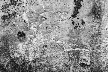 Texture of a concrete wall with cracks and scratches which can be used as a background