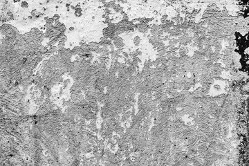 Texture of a concrete wall with cracks and scratches which can be used as a background