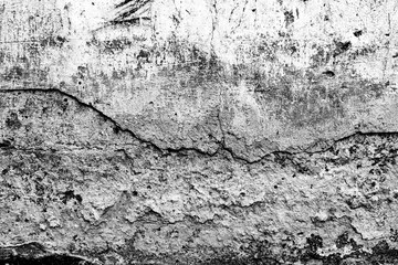 Obraz premium Texture of a concrete wall with cracks and scratches which can be used as a background