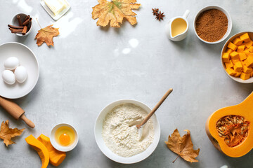 Fototapeta na wymiar Autumn baking background with pumpkin pie baking ingredients