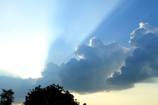 Sun Rays Coming Out From Clouds