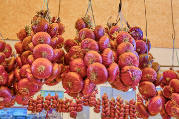 Local yalta onions at the authentic bazaar of a resort town on the Black Sea coast of the Crimea, Russia, Ukraine.
