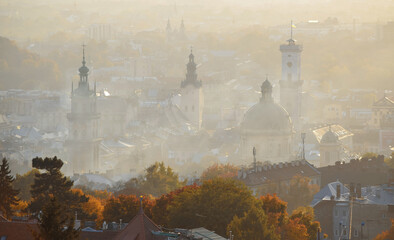 Amazing panoramic view of historical city center of Lviv, Ukraine in autumn morning haze. UNESCO...