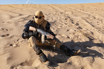 Post apocalyptic warrior sitting in the desert.