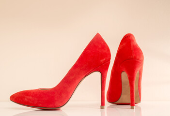 Genuine Red suede high heel shoes and jeans.