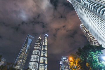skyscrapers at night in shanghai, china.