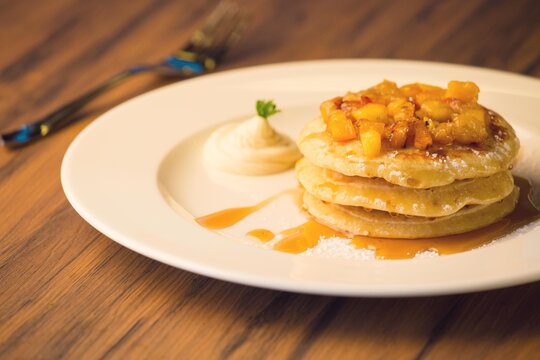 Apple pancakes with maple syrup