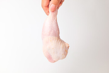 Trimmed chicken legs on a white background