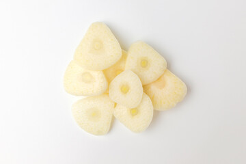 Manicured garlic on white background