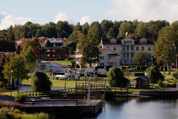 Fototapeta na wymiar Sunne, Sweden The idyllic little harbour of Sunne and small motorboats.