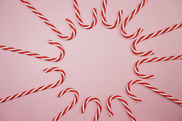 Christmas Candy can ornament on pink background