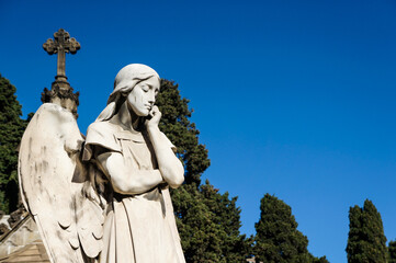 Obraz premium Angel statue at Montjuic Cemetery in Barcelona, Spain