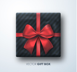 Realistic black Gift box with red bow. Gift presents view top. Happy New Year. Merry Christmas banner