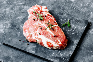Raw marble pork steak
