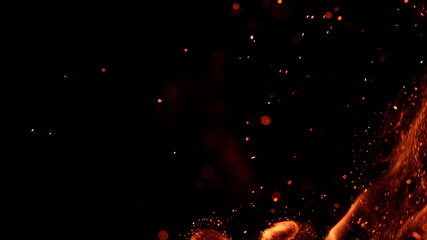 fire flames with sparks on a black background, close-up
