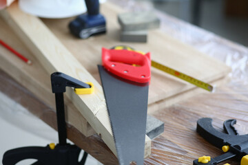 Workbench with wooden blocks and carpentry tools