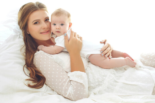 A woman with a baby. Mother and child. High quality photo.