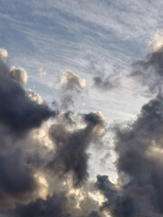 Storm clouds on clear sky