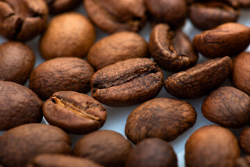 Coffee beans close-up background. Fresh roasted