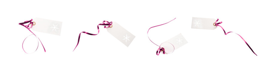 A collection of gift tags and label template with pink ribbon attached to add to presents, Christmas or birthday gifts isolated against a white background.
