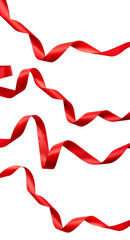 A collection of curly red ribbon for Christmas and birthday present banner isolated against a white...