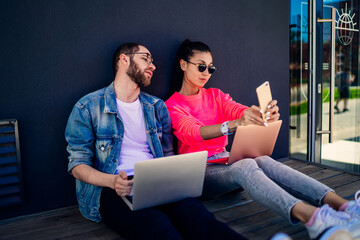 Male and female friends shooting influence video vlog for create media content and share to social...