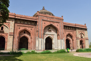 A mesmerizing view of architecture of main tomb at old fort from side lawn.