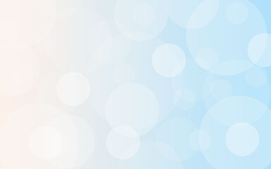Abstract light blue background with bokeh.