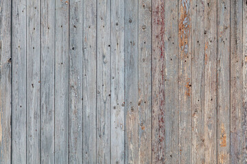Wooden boards on an old fence as an abstract background.