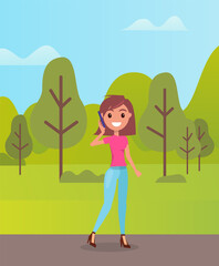 Young smiling girl wearing pink t-shirt and jeans, stylish shoes at heels. Fashionable woman with bob hairstyle walking in green park or in wood. Cheerful girl posing, talking by phone. Summer nature