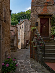 Narrow street at the old town of Sorano at the Tuscany Region in Italy 