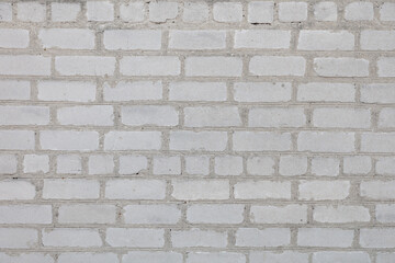 White bricks in the wall of the house