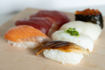 Japanese dish Sushi on wooden plate