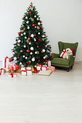 Decorated room with beautiful Christmas tree and gifts