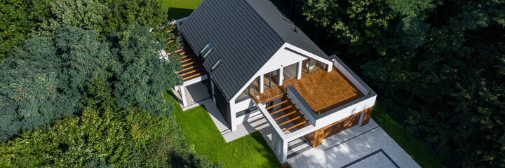 Drone view of house in forest, panorama